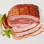 Cold baked ham, partly sliced